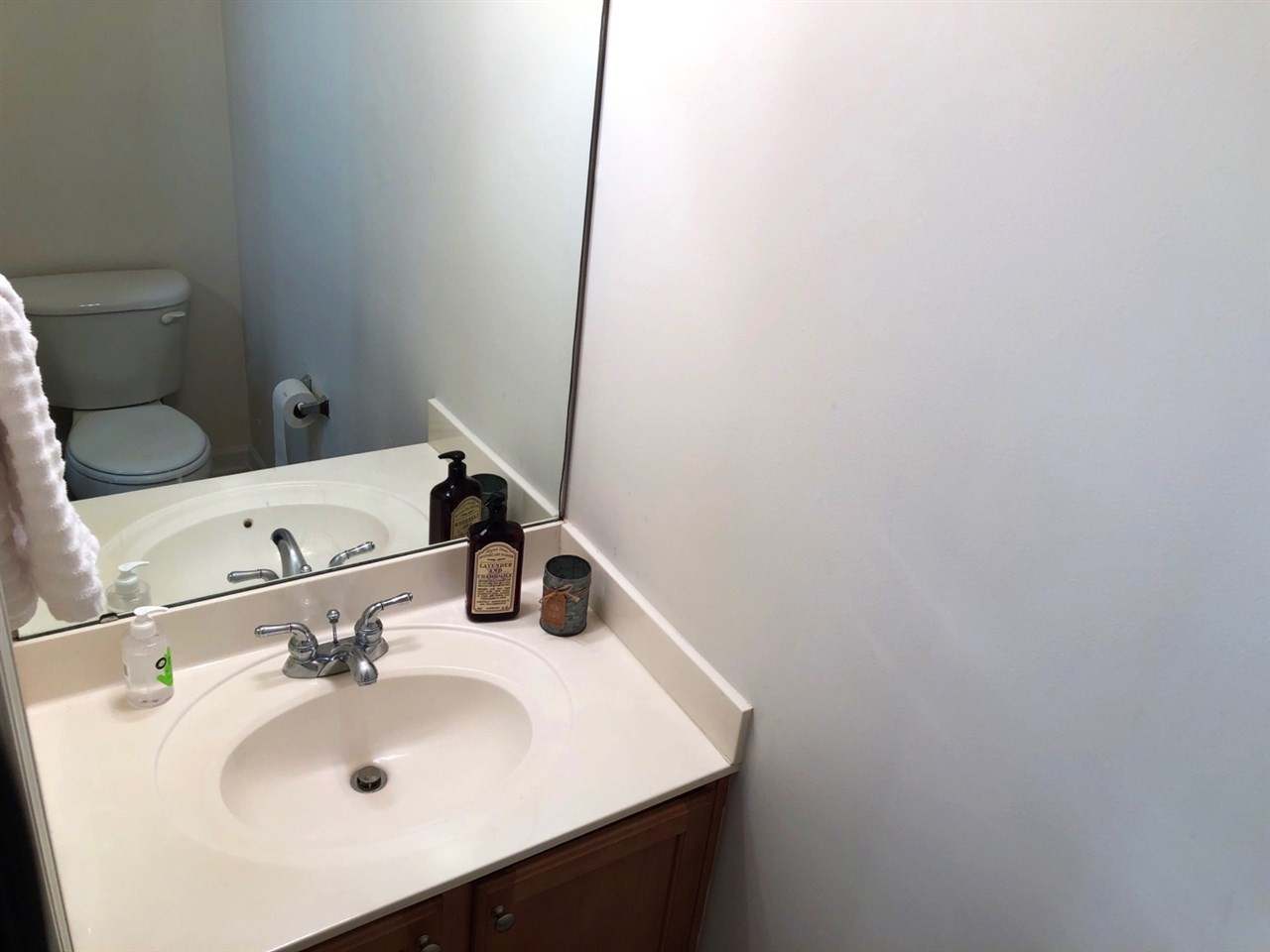 5400 Glass Ridge Road Raleigh, NC 27616 - Photo 14 of 30 The guest bathroom on the first floor is positioned smartly in between the kitchen and the dinning spaces. 1/2 bathroom