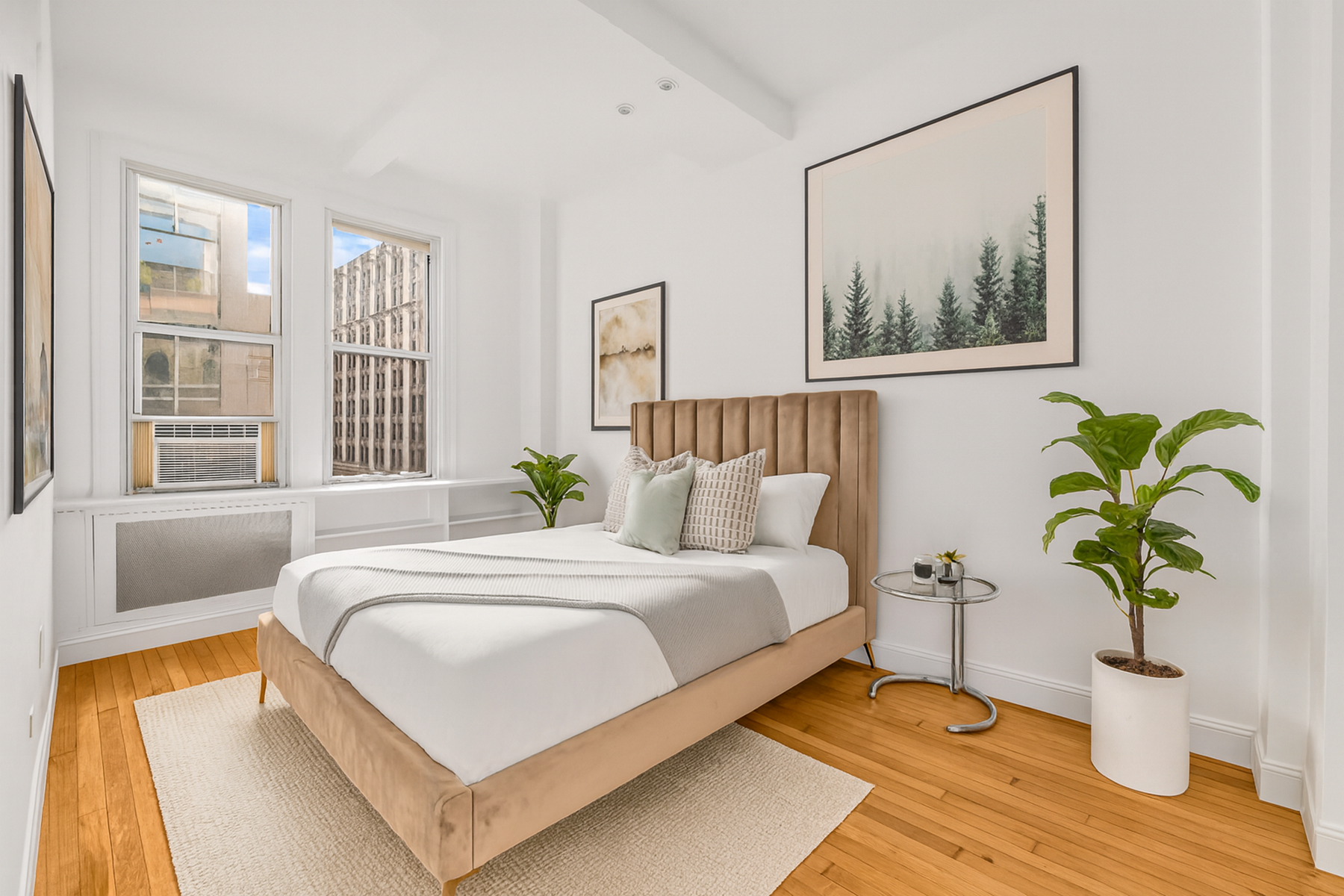 66 Madison Avenue, Unit 9C Manhattan, NY 10016 - Photo 4 of 7 a bedroom with bed and a window