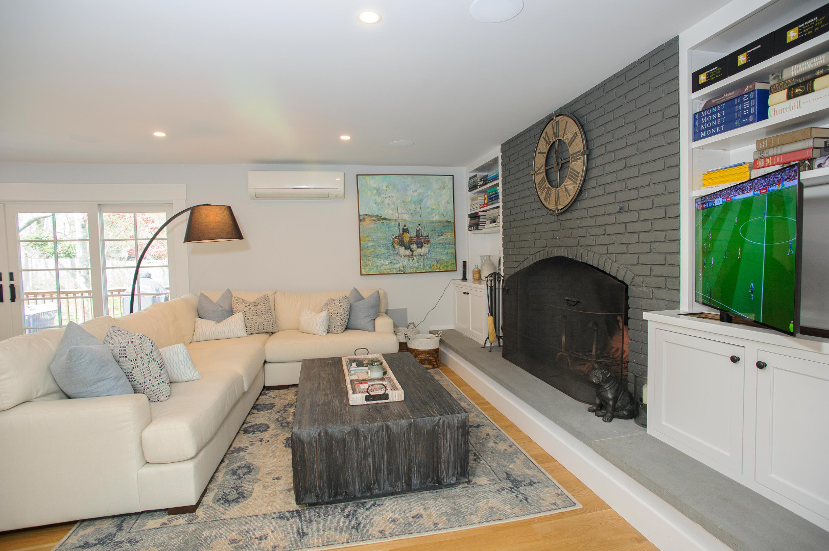 31 North Street Edgartown, MA 02539 - Photo 23 of 49 a living room with furniture and a fireplace