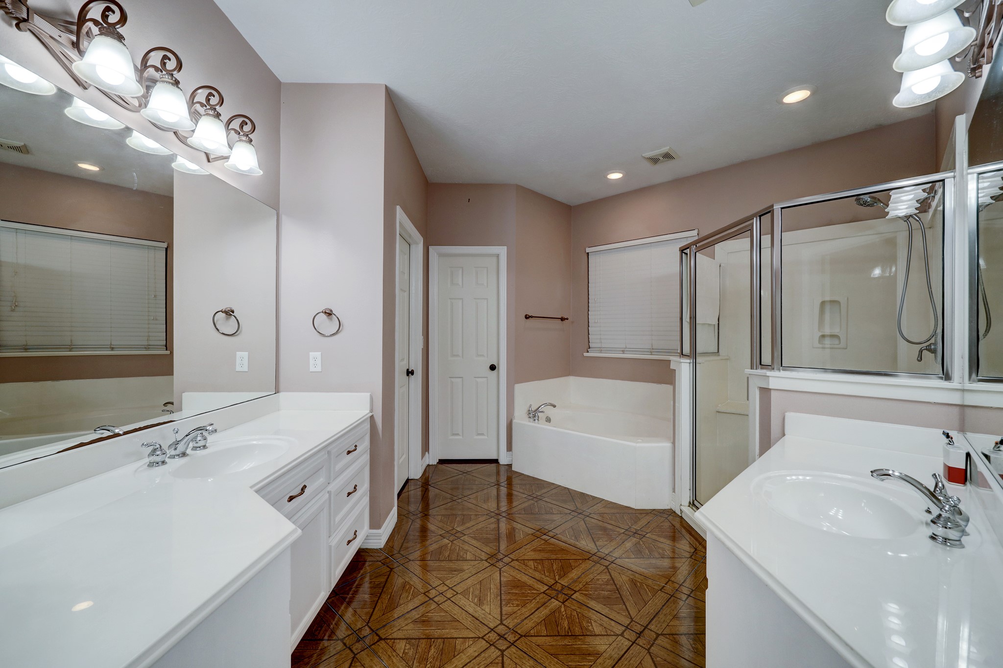 2949 Hargraves Road Huffman, TX 77336 - Photo 11 of 34 a spacious bathroom with a tub sink shower and mirror