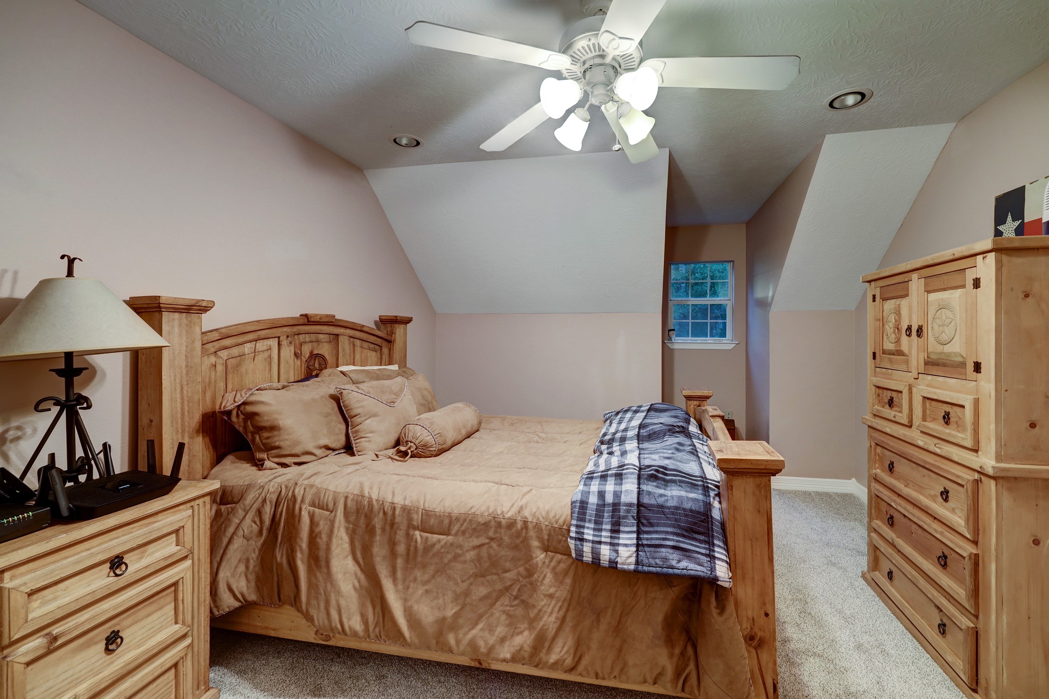 2949 Hargraves Road Huffman, TX 77336 - Photo 16 of 34 a bedroom with a bed and wooden floor