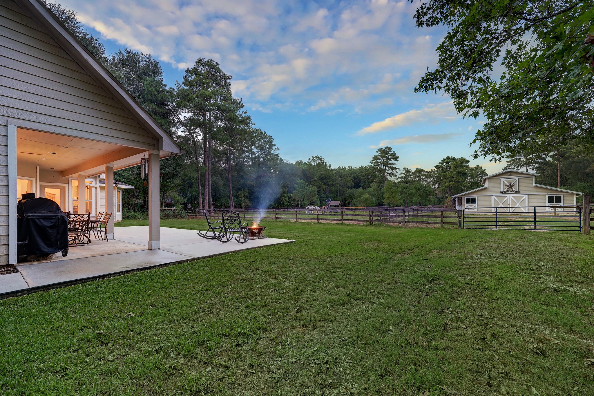 2949 Hargraves Road Huffman, TX 77336 - Photo 23 of 34 a view of a house with backyard and sitting area