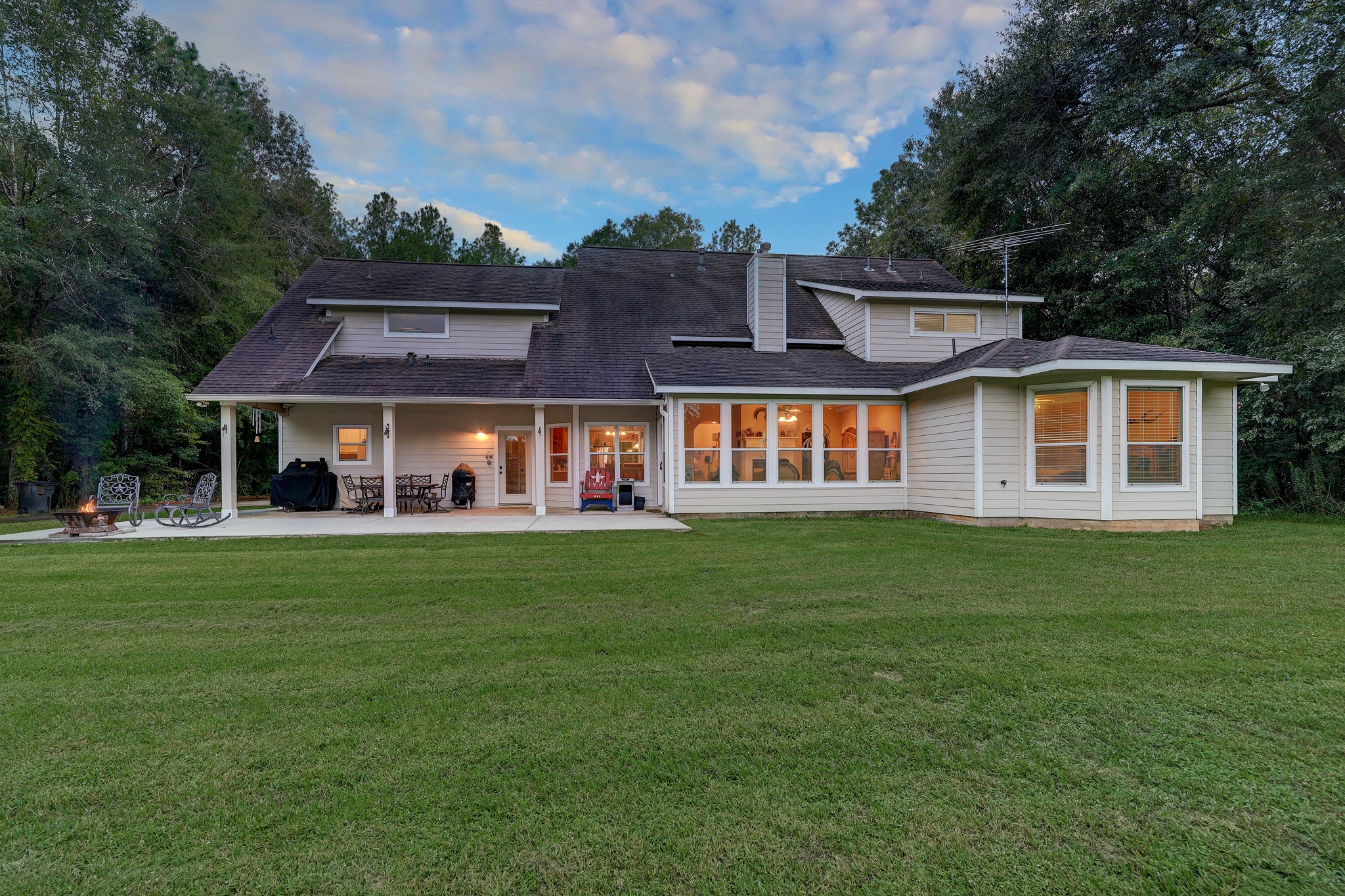 2949 Hargraves Road Huffman, TX 77336 - Photo 24 of 34 a front view of a house with a garden