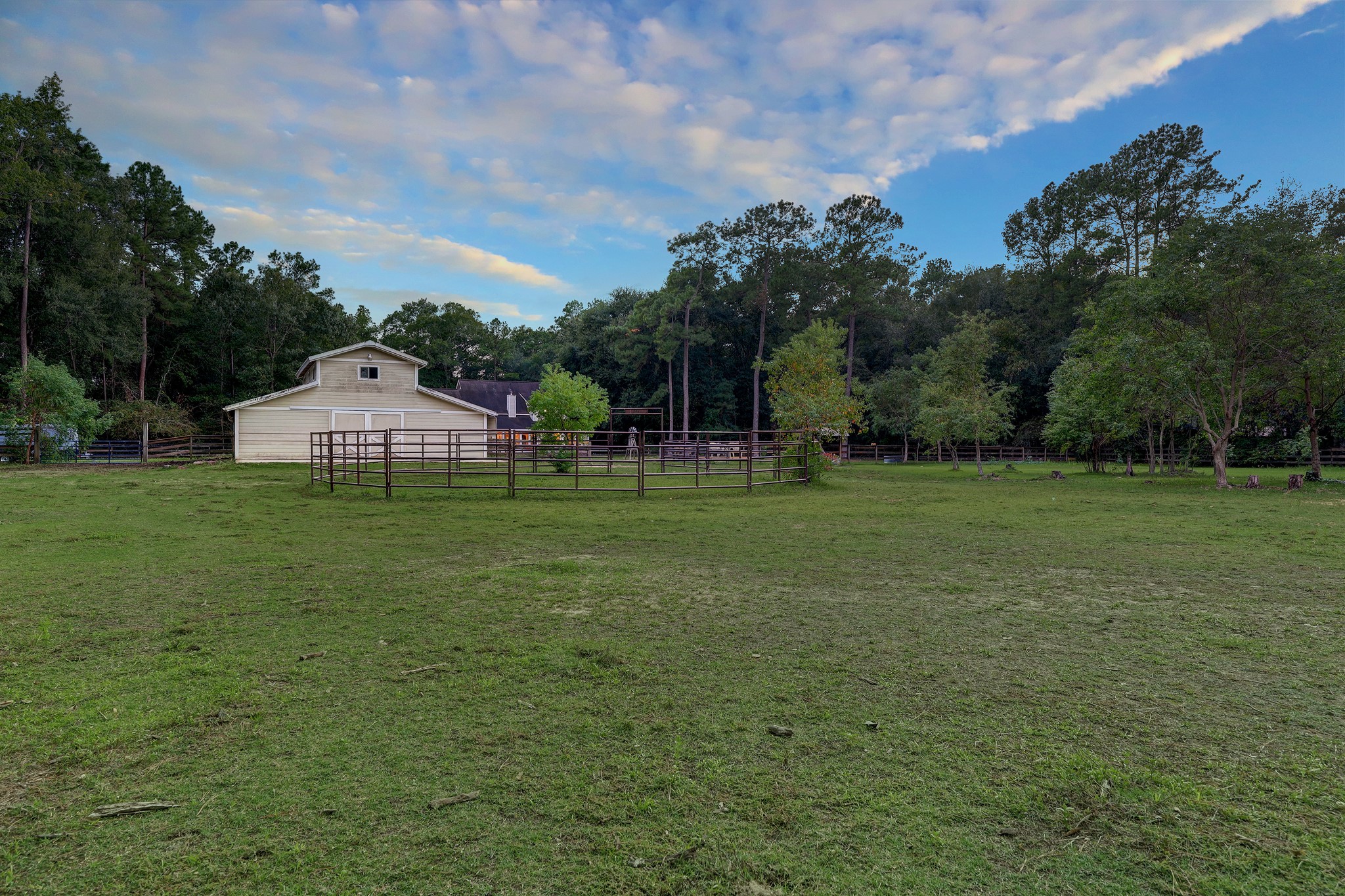 2949 Hargraves Road Huffman, TX 77336 - Photo 25 of 34 a view of a house with a yard