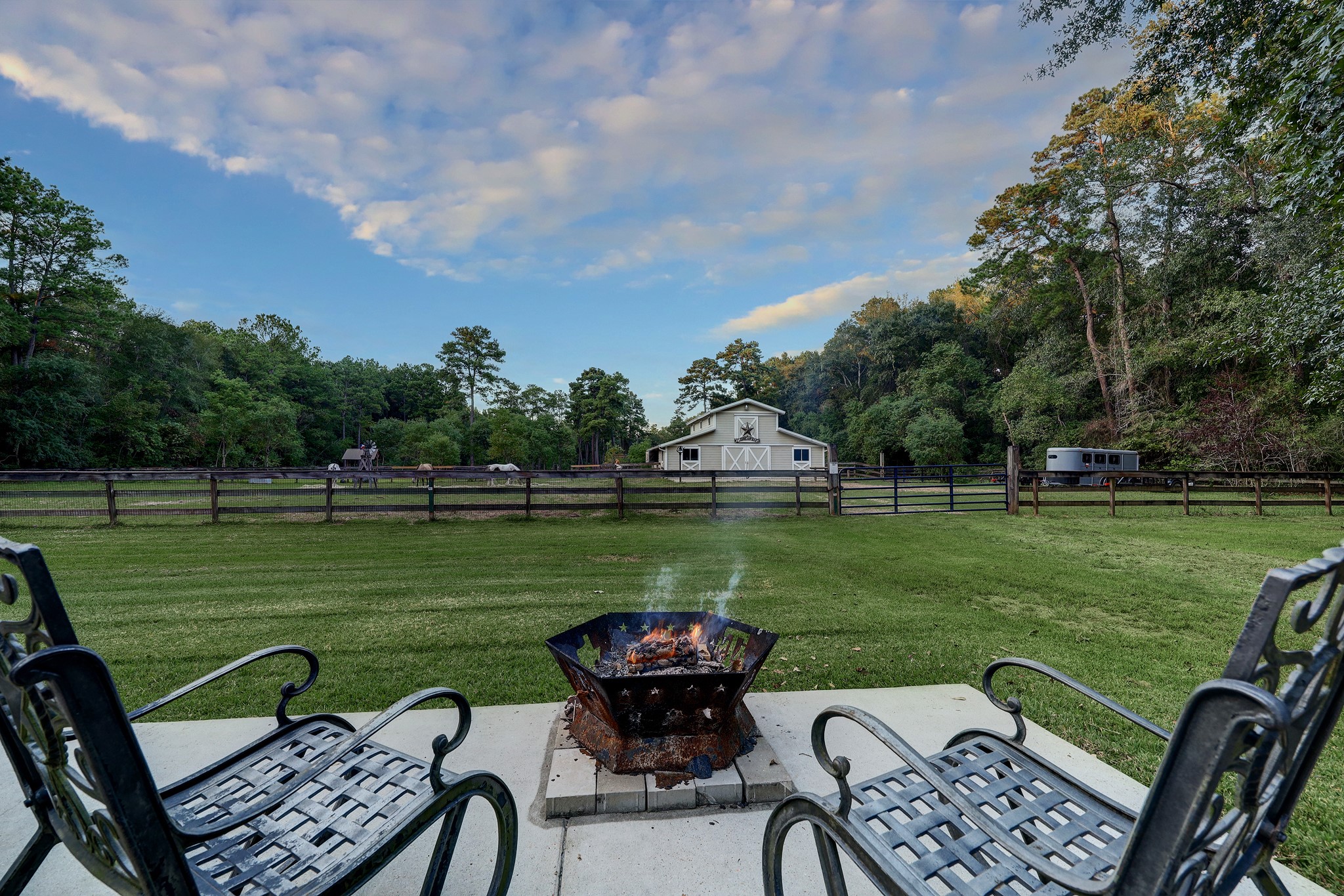 2949 Hargraves Road Huffman, TX 77336 - Photo 3 of 34 a view of a chairs and table in the yard
