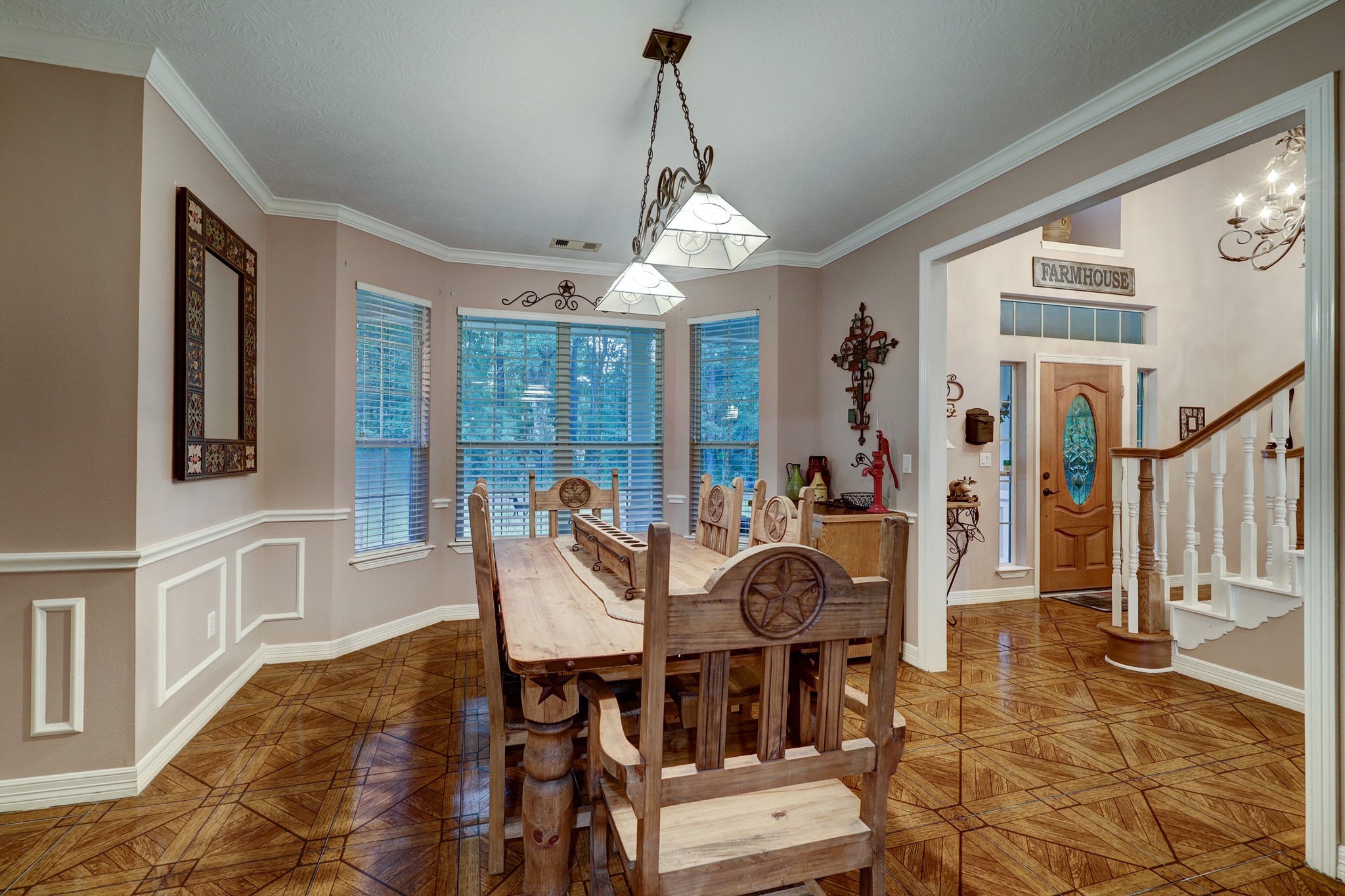2949 Hargraves Road Huffman, TX 77336 - Photo 4 of 34 a view of a dining room with furniture window and wooden floor