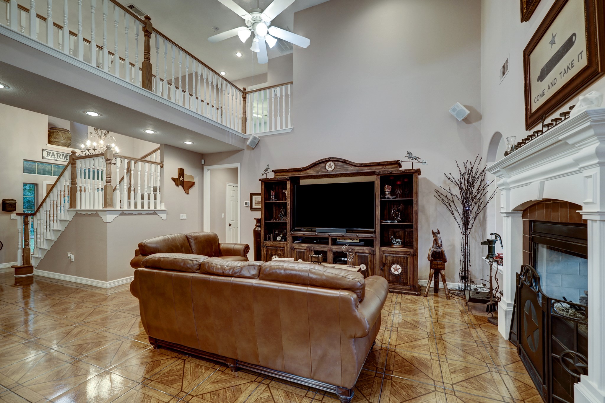2949 Hargraves Road Huffman, TX 77336 - Photo 5 of 34 a living room with furniture and a flat screen tv