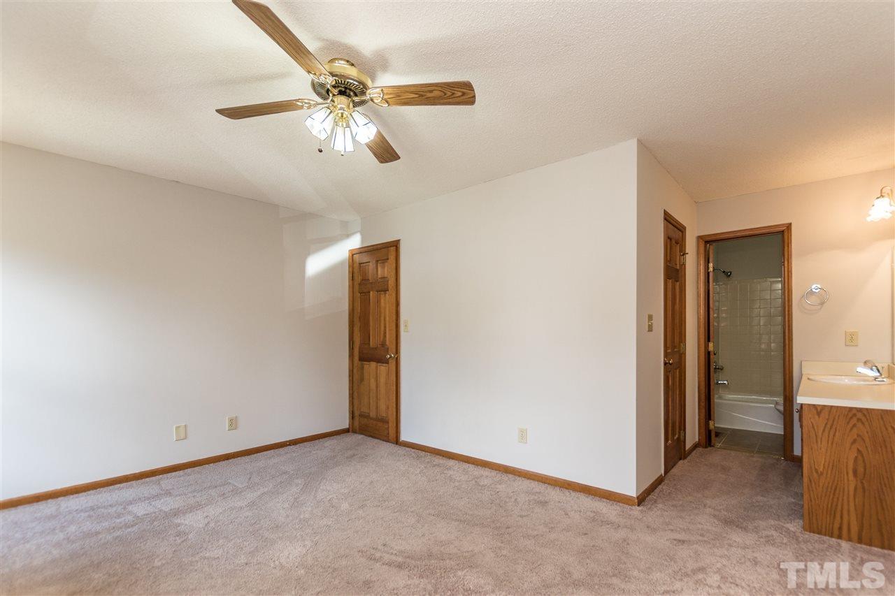 2830 Sterling Park Drive Raleigh, NC 27603 - Photo 15 of 23 MASTER BEDROOM HAS BATHROOM CONNECTED IN A CONVENIENT NOOK!