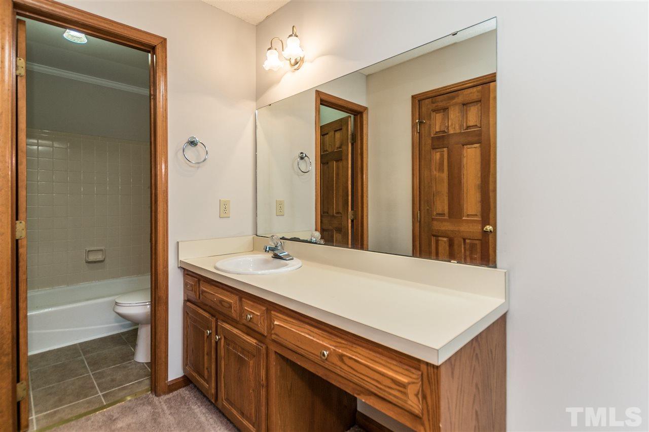 2830 Sterling Park Drive Raleigh, NC 27603 - Photo 16 of 23 LARGE VANITY AND AMPLE DRAWERS FOR BATHROOM STORAGE!