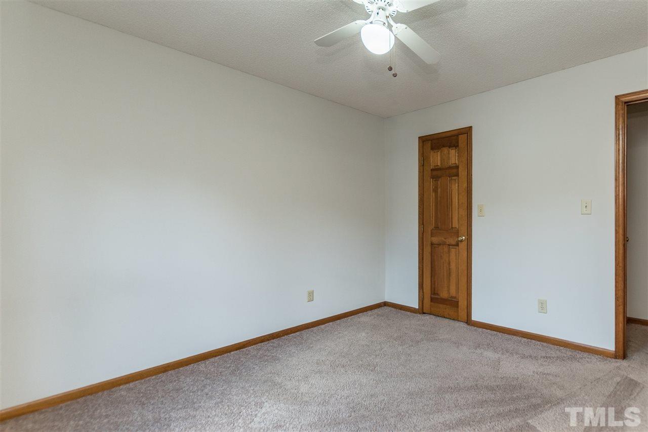 2830 Sterling Park Drive Raleigh, NC 27603 - Photo 21 of 23 MORE FRESHLY PAINTED WALLS, NATURAL LIGHTING, AND A CEILING FAN TO KEEP THE ROOM COOL!