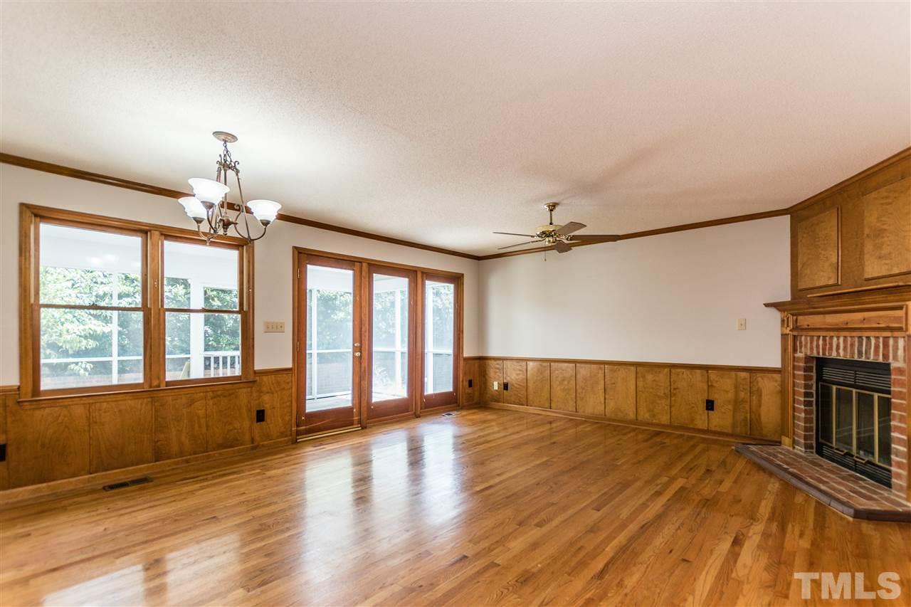 2830 Sterling Park Drive Raleigh, NC 27603 - Photo 4 of 23 THIS LIVING ROOM PROVIDES LOTS OF NATURAL LIGHTING WITH A FIREPLACE AND CEILING FAN!