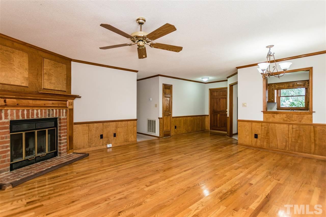 2830 Sterling Park Drive Raleigh, NC 27603 - Photo 6 of 23 SPACIOUS FAMILY ROOM AND WINDOW OPENING TO KITCHEN!