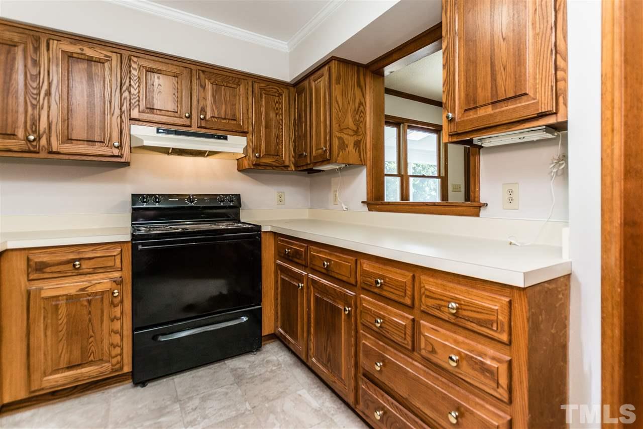2830 Sterling Park Drive Raleigh, NC 27603 - Photo 9 of 23 LOTS OF COUNTER SPACE AND OPEN WINDOW FACING THE LIVING ROOM!