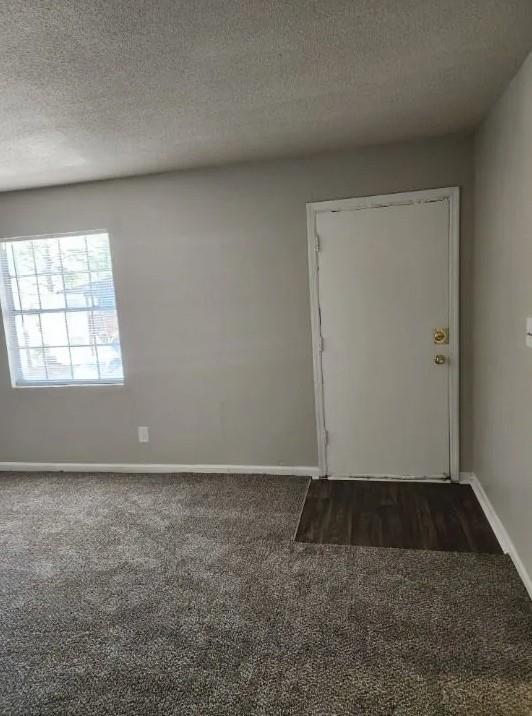 460 Main Street Forest Park, GA 30297 - Photo 2 of 10 an empty room with wooden floor and windows
