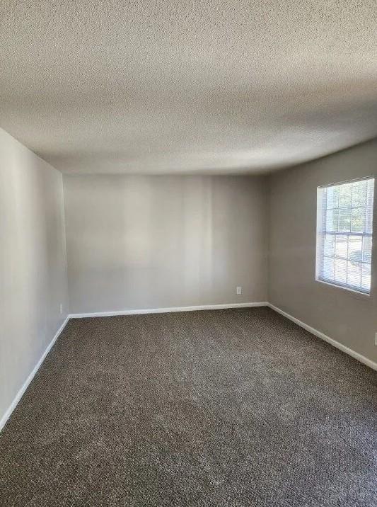 460 Main Street Forest Park, GA 30297 - Photo 3 of 10 an empty room with a window