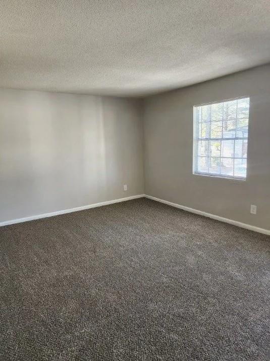 460 Main Street Forest Park, GA 30297 - Photo 5 of 10 an empty room with a window
