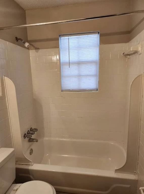 460 Main Street Forest Park, GA 30297 - Photo 6 of 10 a bathroom with a bathtub and a shower