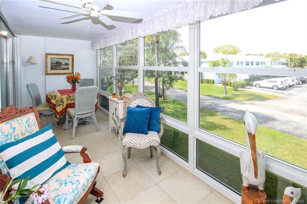 2929 Southeast Ocean Boulevard, Unit 1189 Stuart, FL 34996 - Photo 21 of 34 a outdoor living space with furniture