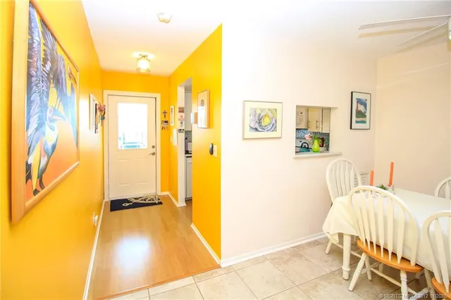 a view of a bedroom with a bed and a couch