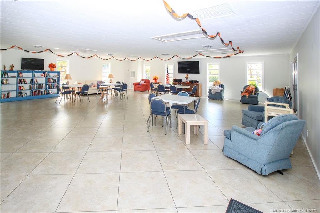 2929 Southeast Ocean Boulevard, Unit 1189 Stuart, FL 34996 - Photo 32 of 34 a view of a living room and dining room