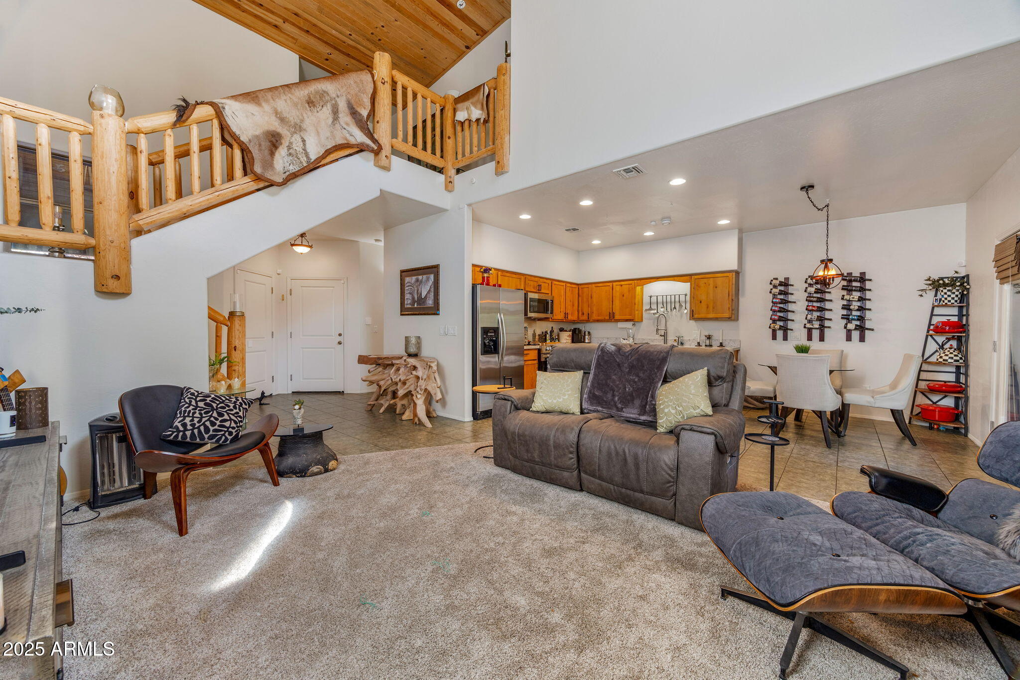 6935 Starlight Ridge Road Lakeside, AZ 85929 - Photo 9 of 33 a living room with furniture and a gym equipment