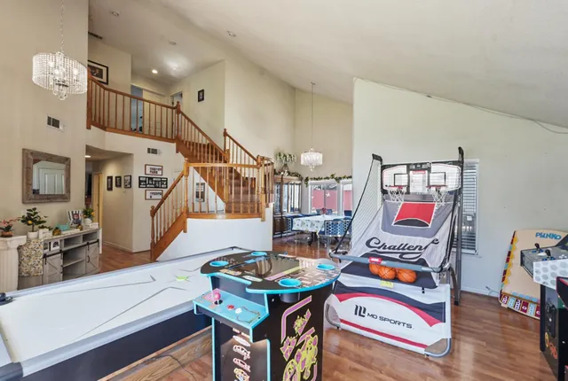 a living room with furniture and a table