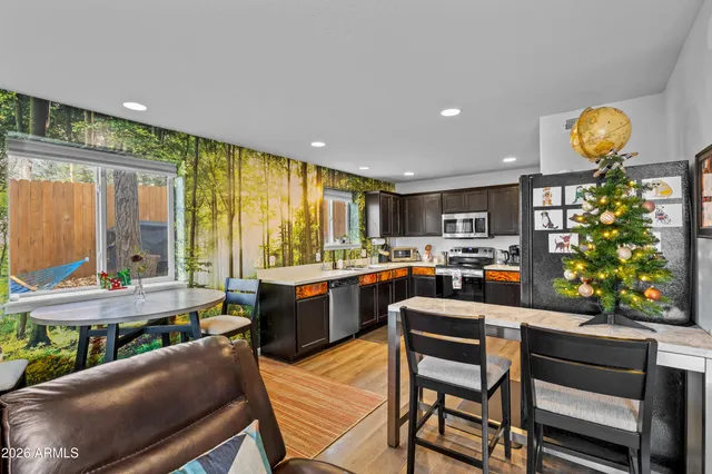 a view of walk in closet and bedroom