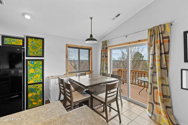 a kitchen with stainless steel appliances granite countertop a stove and a refrigerator