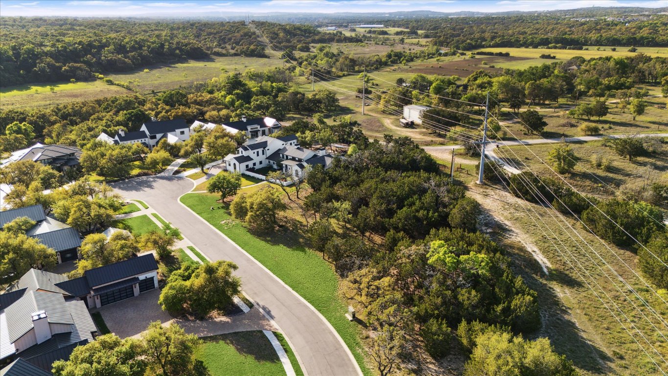 274 Waters Edge Dripping Springs, TX 78620 - Photo 6 of 9 an aerial view of residential houses with outdoor space