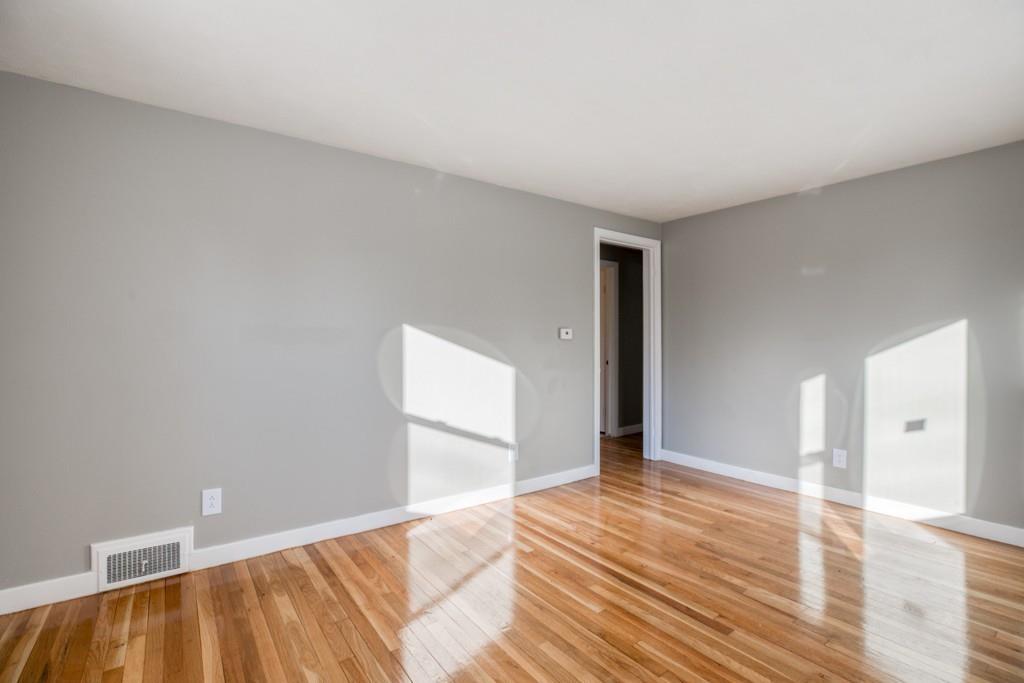110 Gilman Street Springfield, MA 01118 - Photo 9 of 24 a view of a livingroom with wooden floor