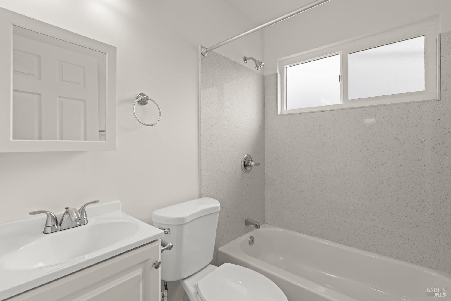 688 Grove Way Hayward, CA 94541 - Photo 12 of 20 a bathroom with a sink toilet and shower