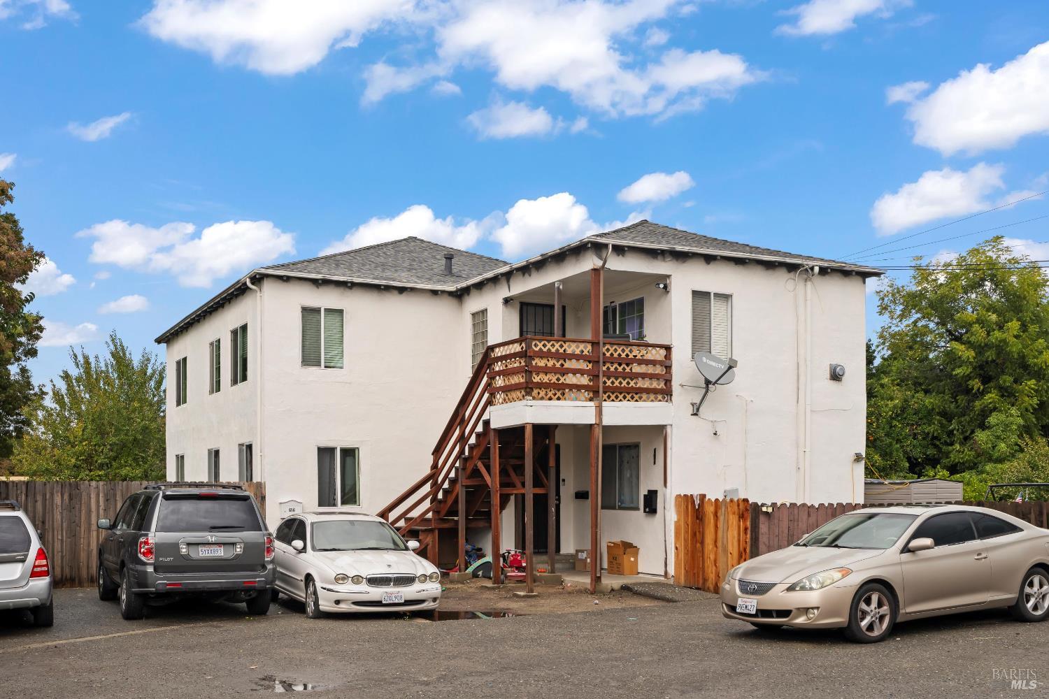 688 Grove Way Hayward, CA 94541 - Photo 4 of 20 a view of a car park in front of house