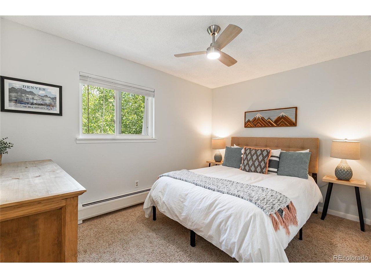 400 Hi Country Drive, Unit 15 Winter Park, CO 80482 - Photo 17 of 35 Tree-lined view from your bedroom. New ceiling fan for mountain breezes!