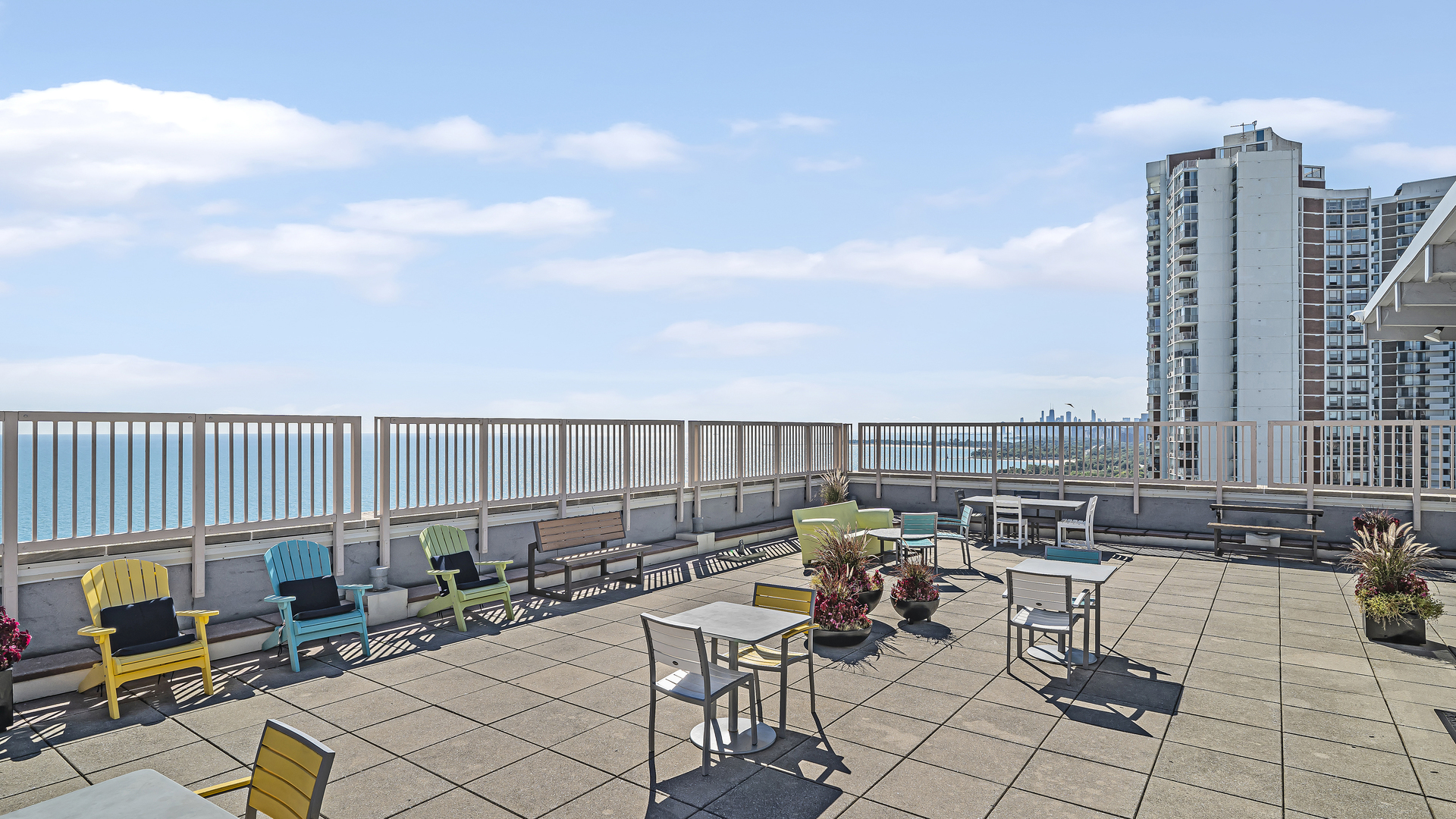 6157 North Sheridan Road, Unit 18K Chicago, IL 60660 - Photo 12 of 14 a view of roof deck with furniture