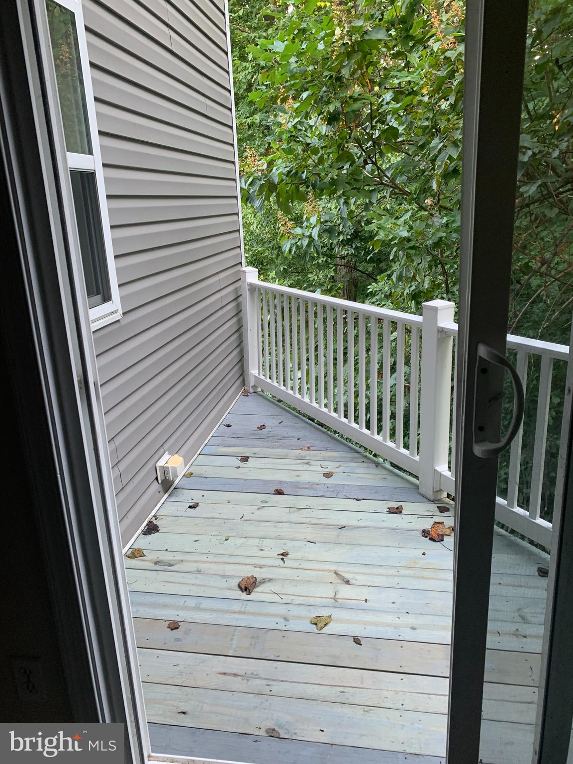 5061 Bayside Road Chesapeake Beach, MD 20732 - Photo 7 of 15 Small porch off dining room