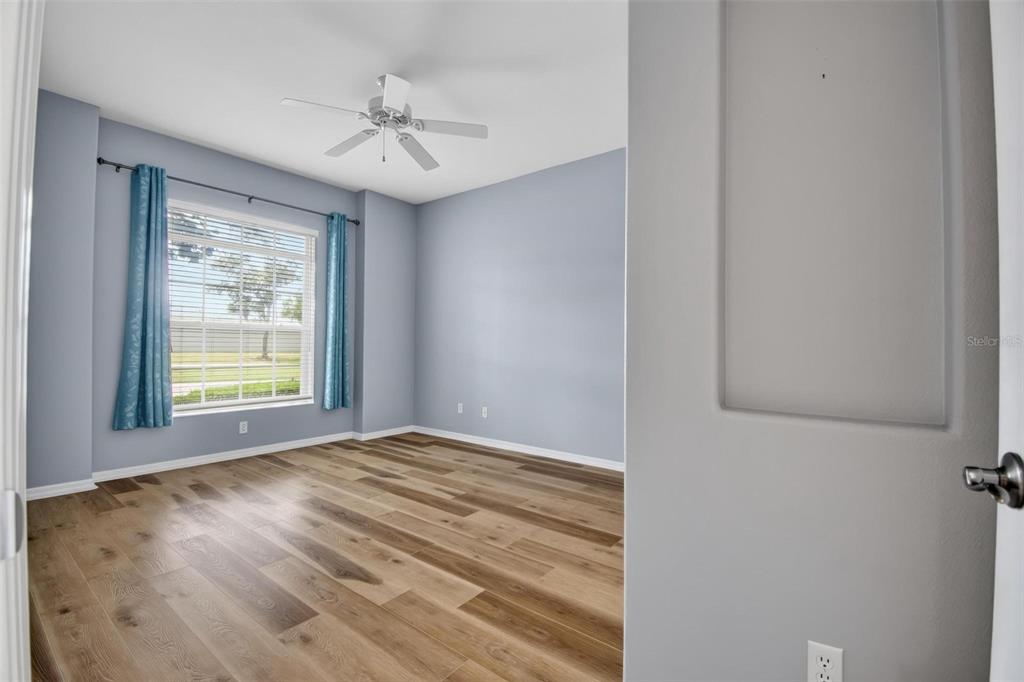 33 Summerwind Circle, Unit 101 Palm Coast, FL 32137 - Photo 13 of 45 a view of an empty room with a window