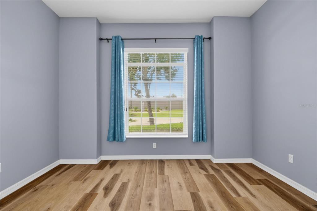 33 Summerwind Circle, Unit 101 Palm Coast, FL 32137 - Photo 15 of 45 a view of an empty room with a window
