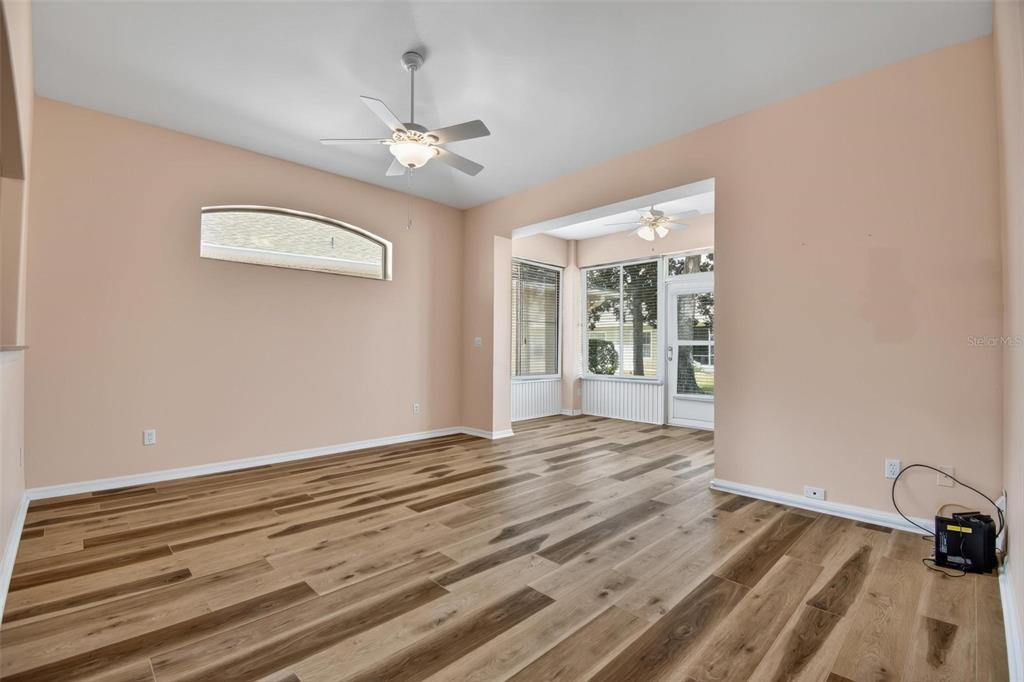 33 Summerwind Circle, Unit 101 Palm Coast, FL 32137 - Photo 22 of 45 a view of a livingroom with wooden floor