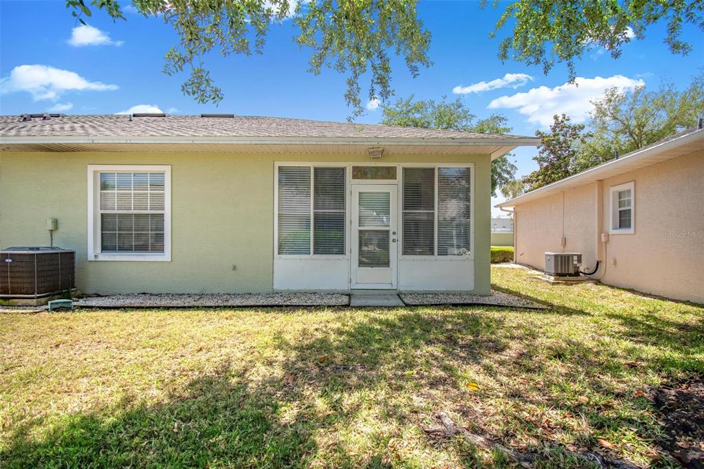33 Summerwind Circle, Unit 101 Palm Coast, FL 32137 - Photo 45 of 45 a view of a house with a outdoor space