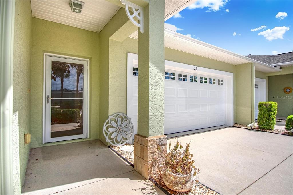 33 Summerwind Circle, Unit 101 Palm Coast, FL 32137 - Photo 10 of 45 a view of front door