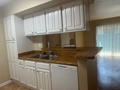 a room with a sink and a chair