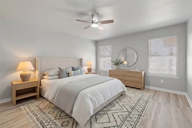 a bedroom with bed and window