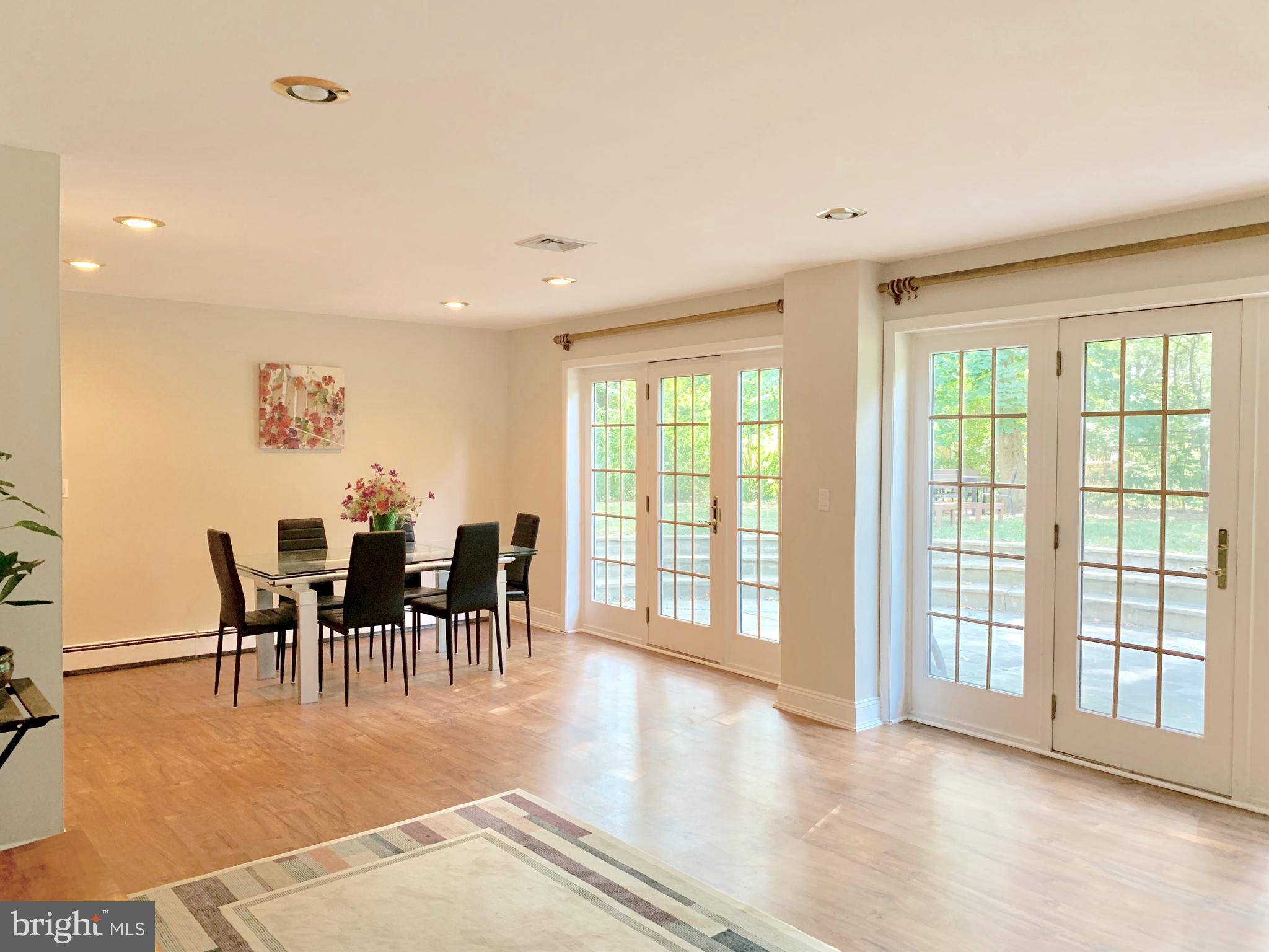 74 Marion Road East Princeton, NJ 08540 - Photo 15 of 32 a view of a dining room with furniture window and wooden floor