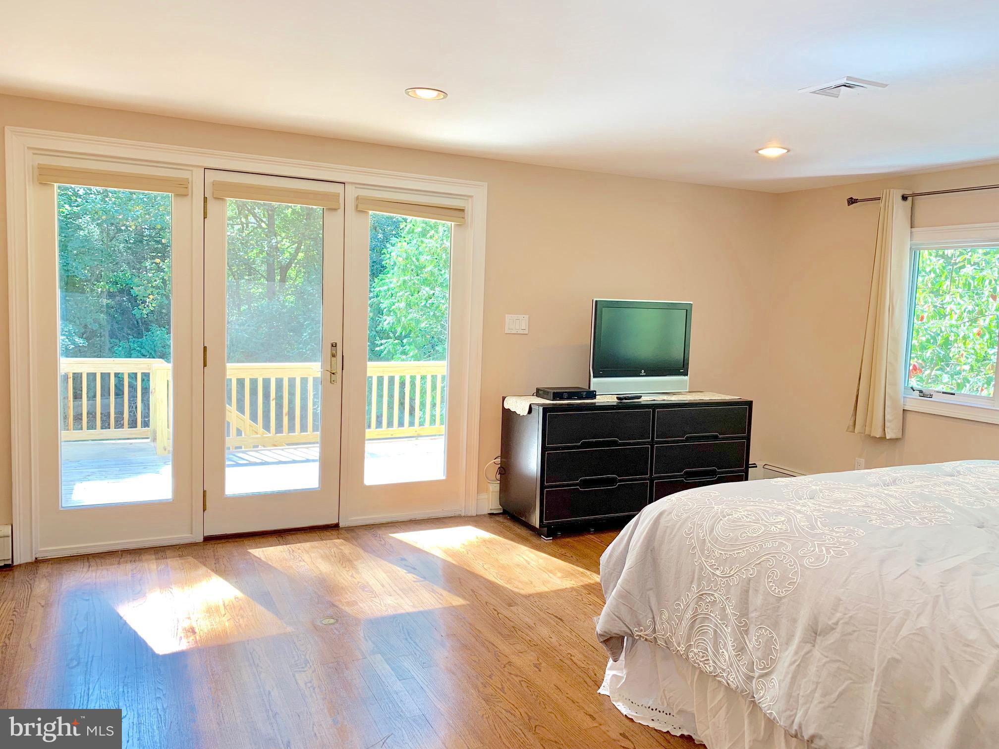74 Marion Road East Princeton, NJ 08540 - Photo 21 of 32 a bedroom with a bed and a television