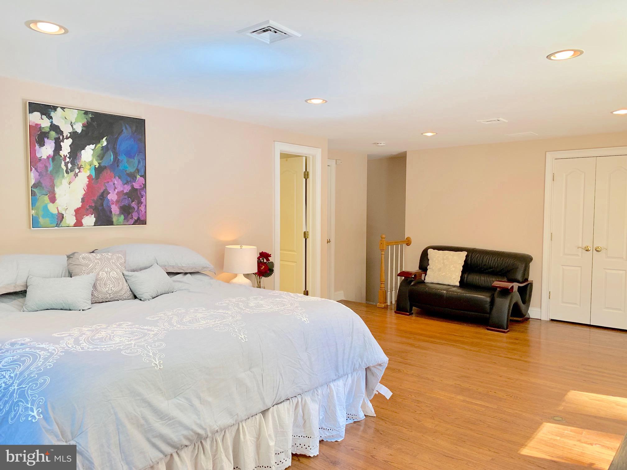 74 Marion Road East Princeton, NJ 08540 - Photo 23 of 32 a bedroom with a bed and a couch
