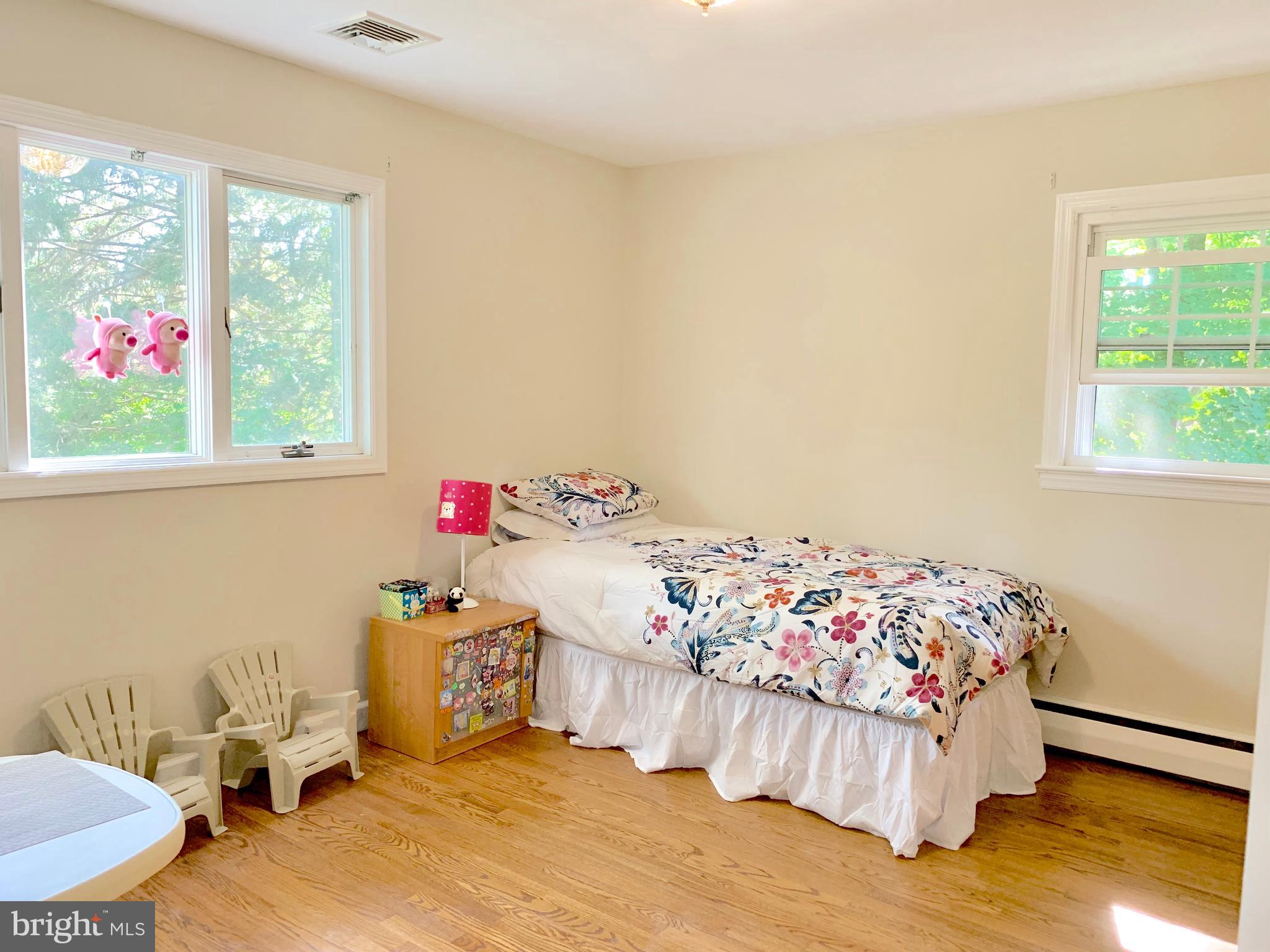 74 Marion Road East Princeton, NJ 08540 - Photo 27 of 32 a bedroom with a bed and a window