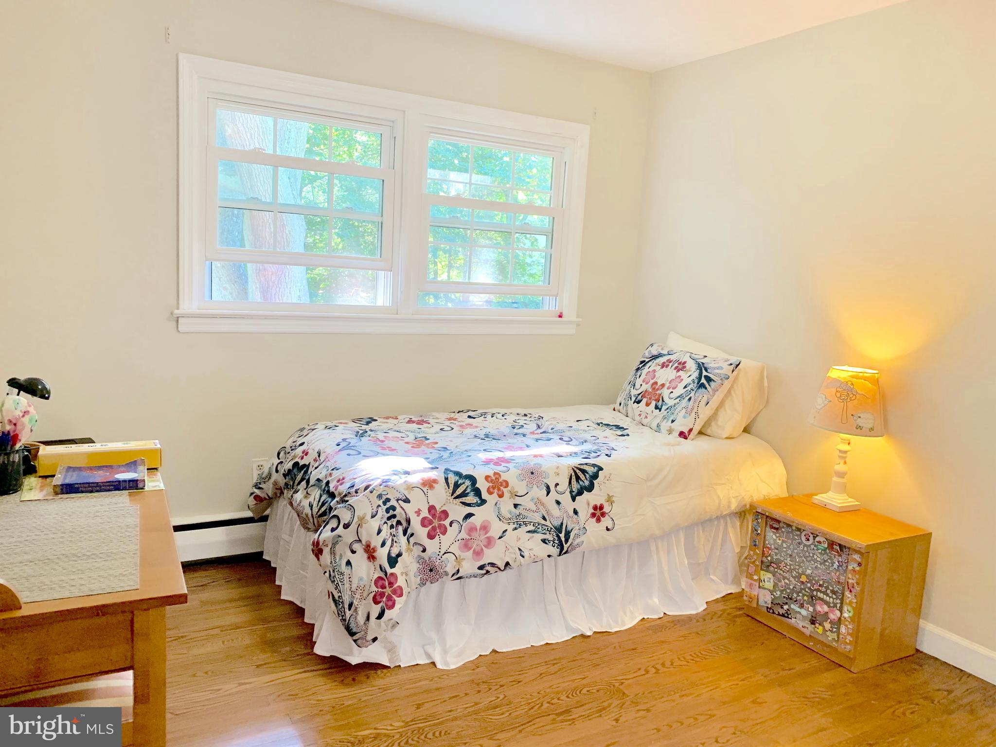 74 Marion Road East Princeton, NJ 08540 - Photo 30 of 32 a bedroom with a bed and a window