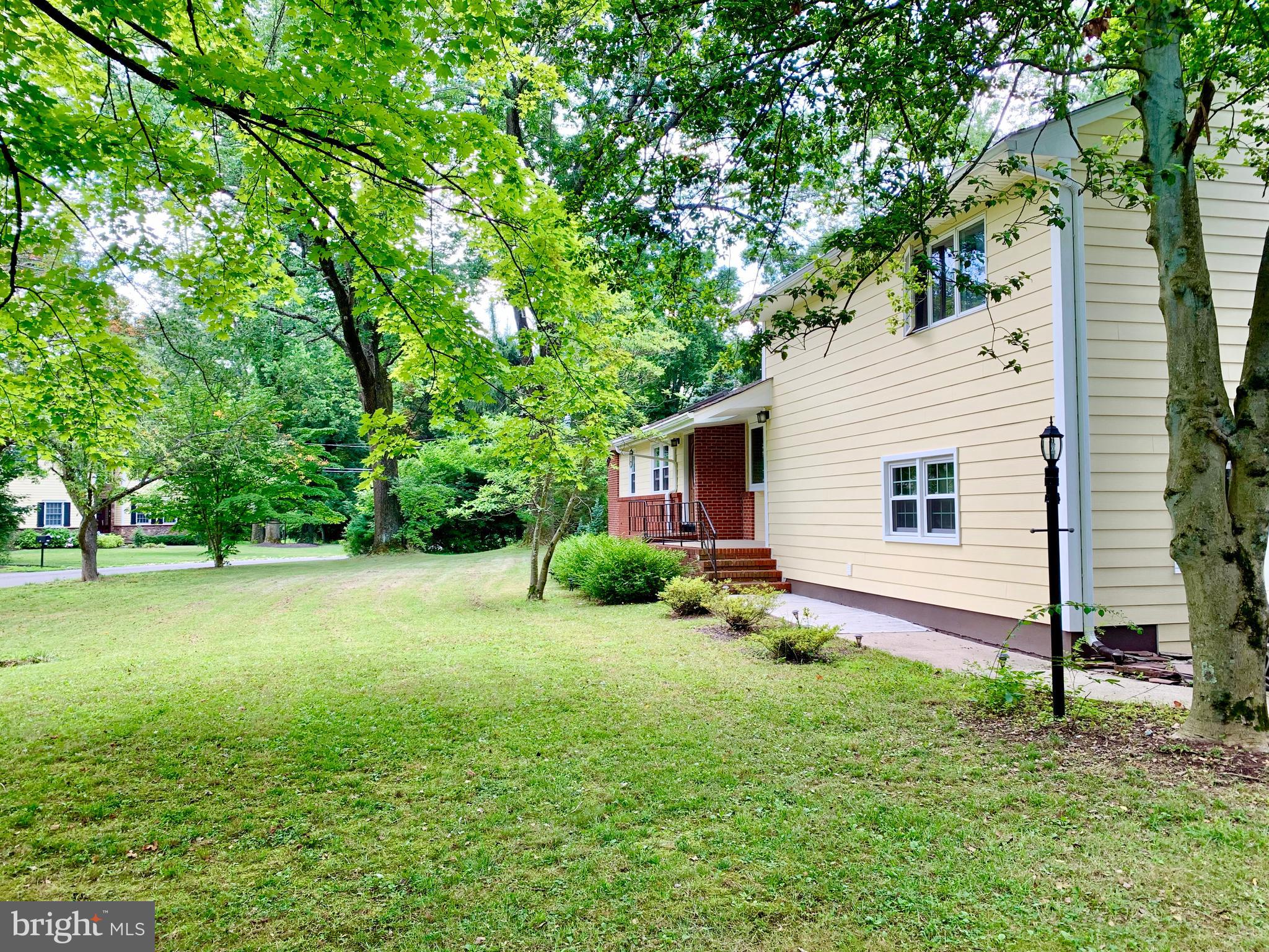 74 Marion Road East Princeton, NJ 08540 - Photo 4 of 32 a view of a backyard with a garden