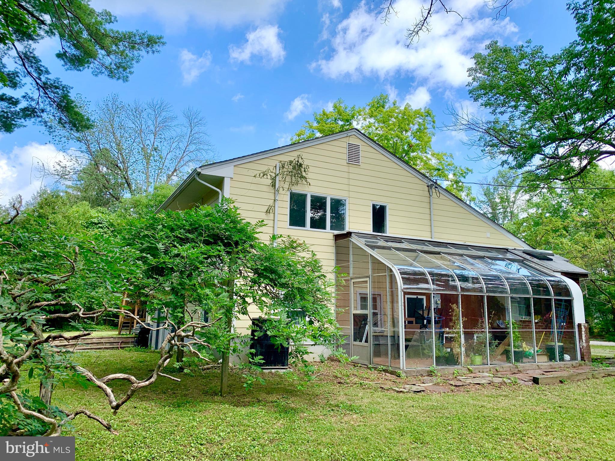 74 Marion Road East Princeton, NJ 08540 - Photo 5 of 32 a front view of a house with a yard