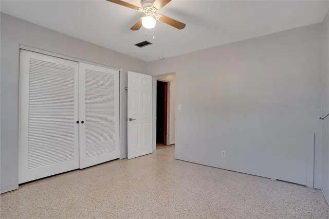 a bathroom with a sink toilet vanity and bathtub